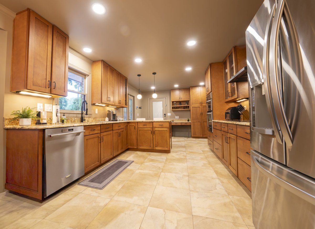 kitchen-stainless-refrigerator-wood-cabinetry-atlanta-ga-optimized