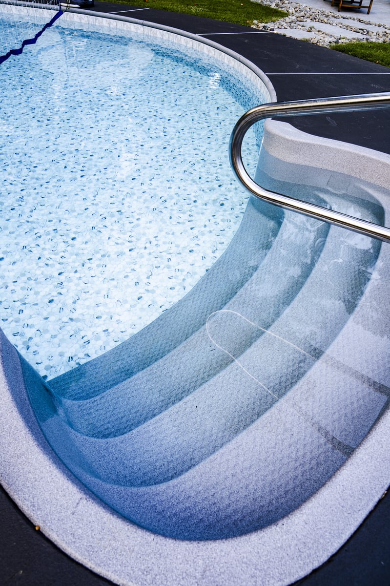 pool-entry-steps-metal-handrail-closeup-atlanta-ga-optimized