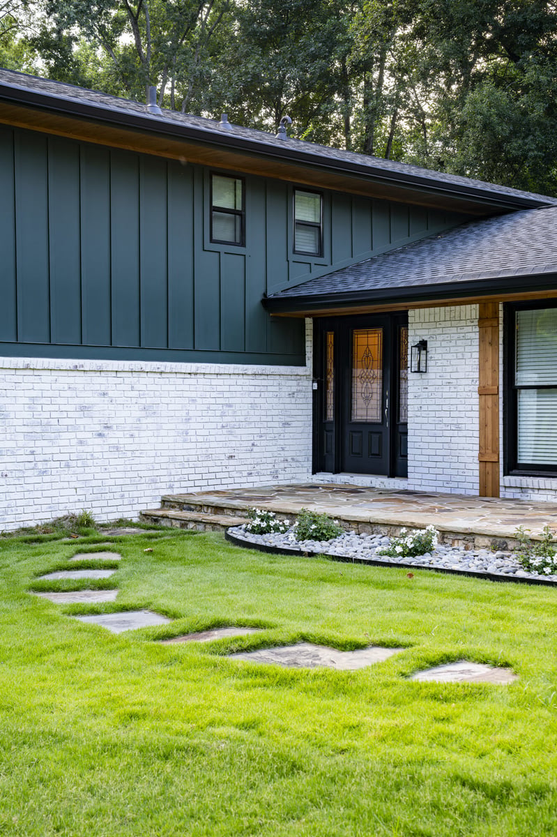 side-exterior-white-brick-board-batten-siding-stone-walkway-atlanta-ga-optimized