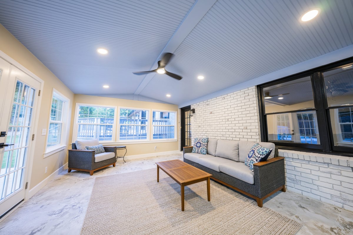 sunroom-brick-wall-mounted-television-seating-atlanta-ga-optimized