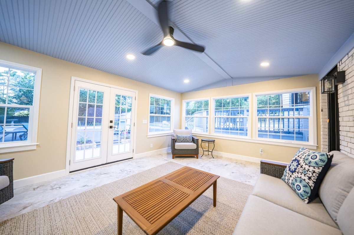 sunroom-seating-area-wood-coffee-table-atlanta-ga-optimized