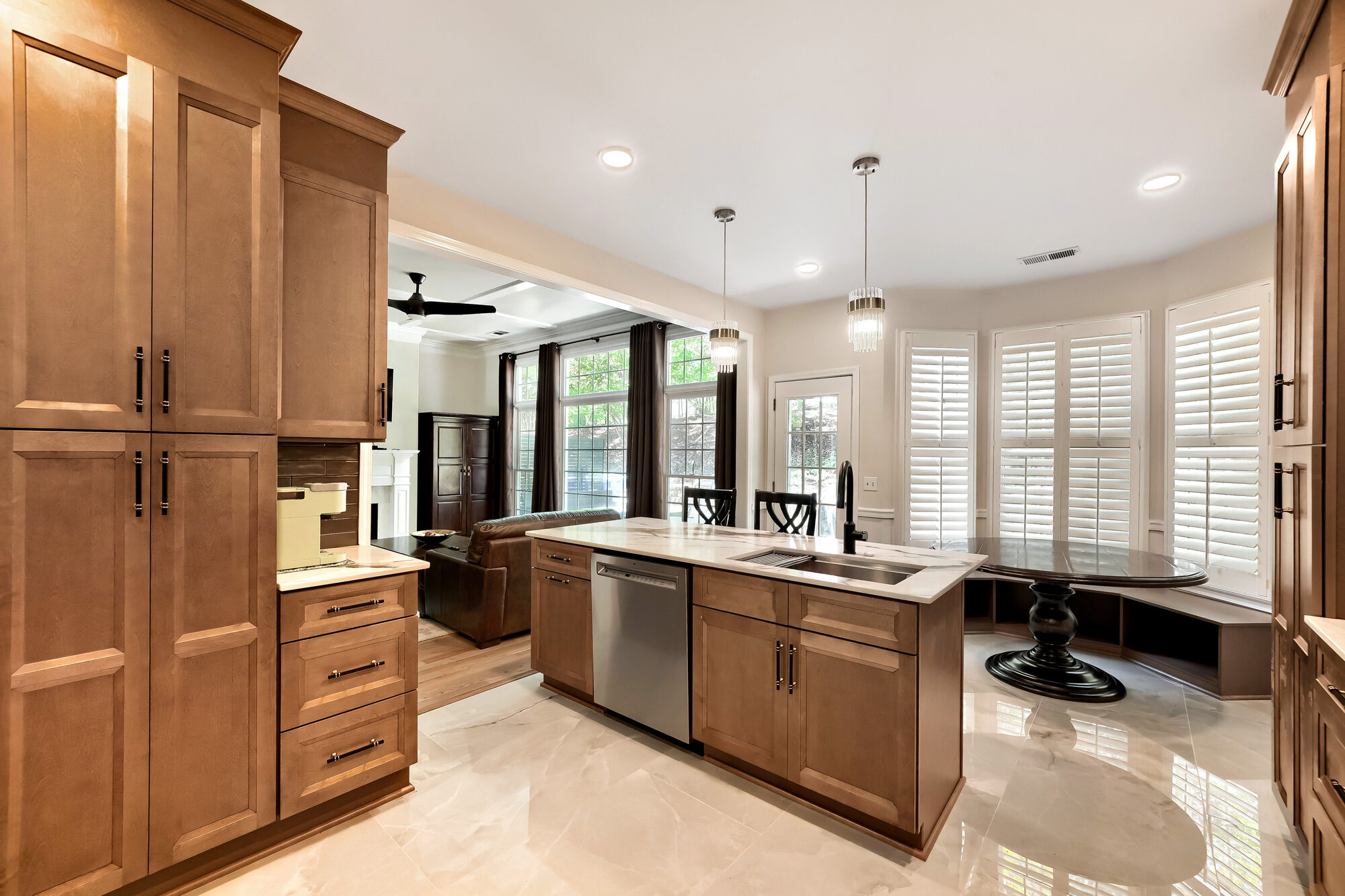 kitchen-wood-cabinetry-island-breakfast-nook-windows-atlanta-ga-optimized