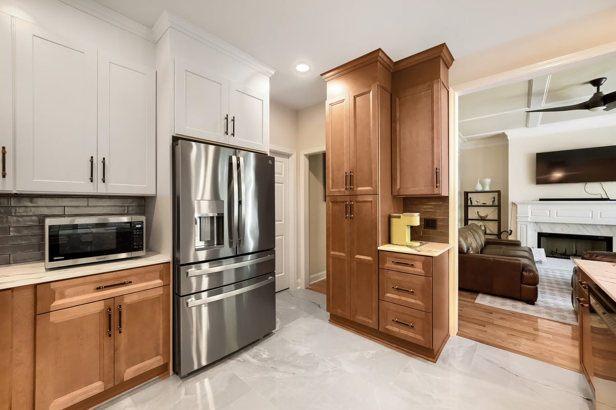 kitchen-cabinetry-built-in-microwave-refrigerator-open-to-living-room-atlanta-ga-optimized