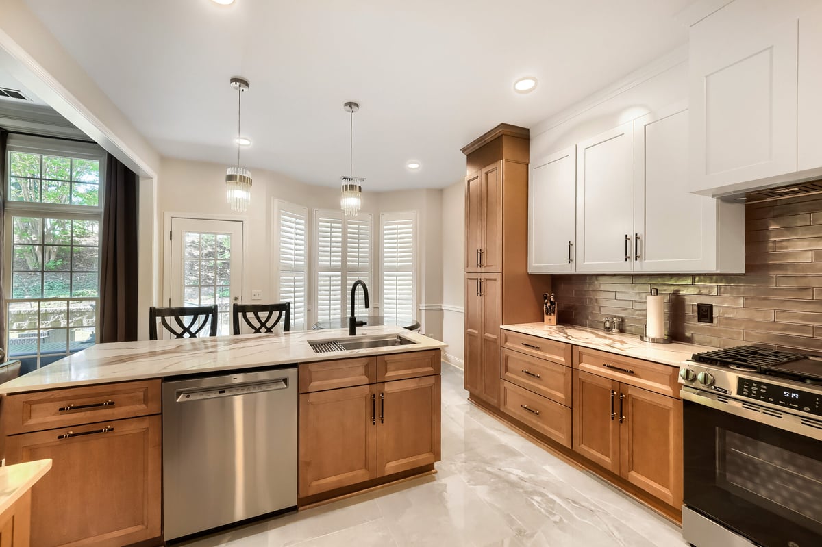 kitchen-two-tone-cabinetry-tile-backsplash-stainless-appliances-atlanta-ga-optimized