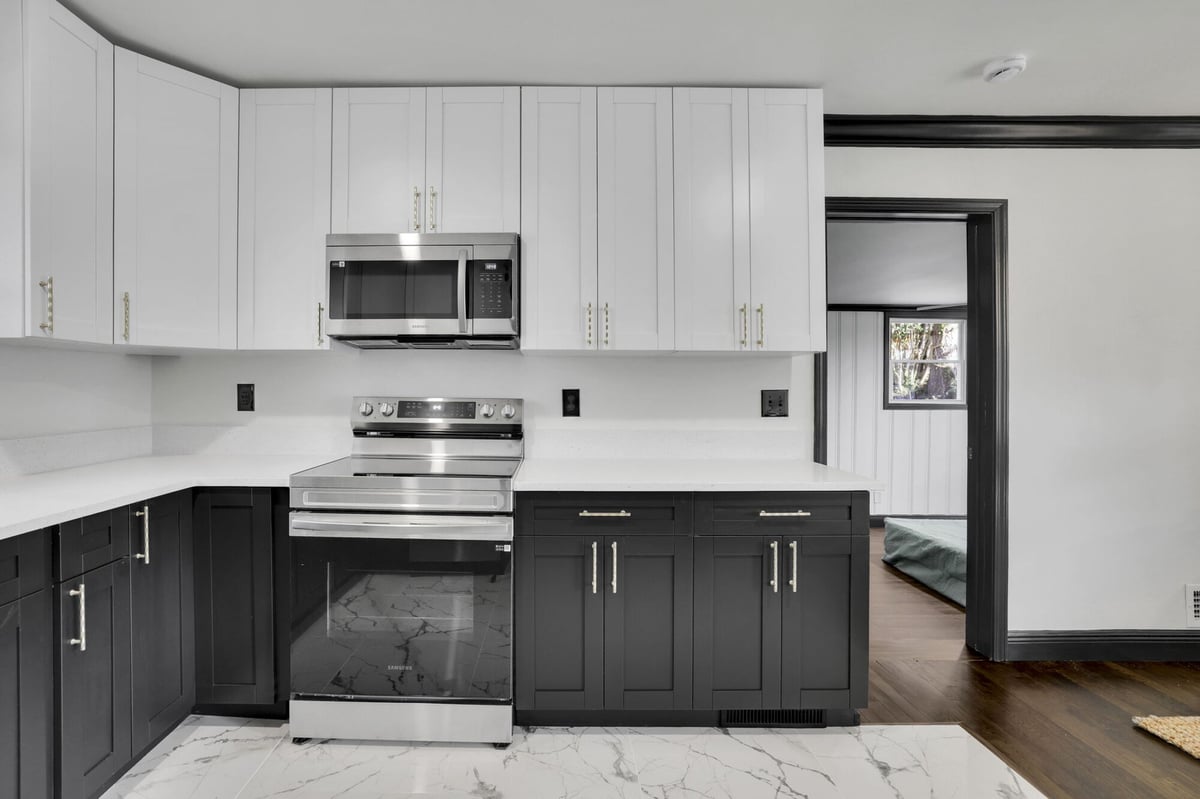 kitchen-range-black-cabinets-doorway-atlanta-ga-optimized