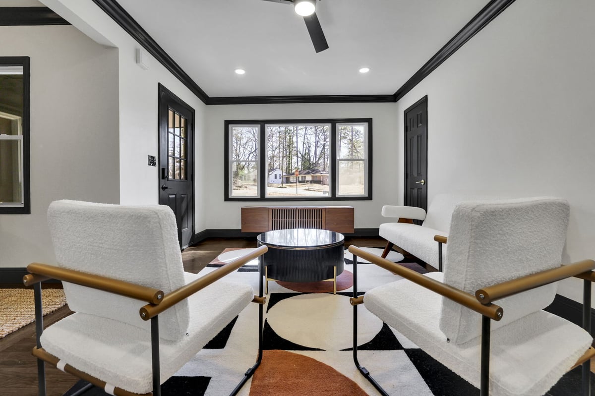 living-room-white-armchairs-black-coffee-table-black-front-door-atlanta-ga-optimized