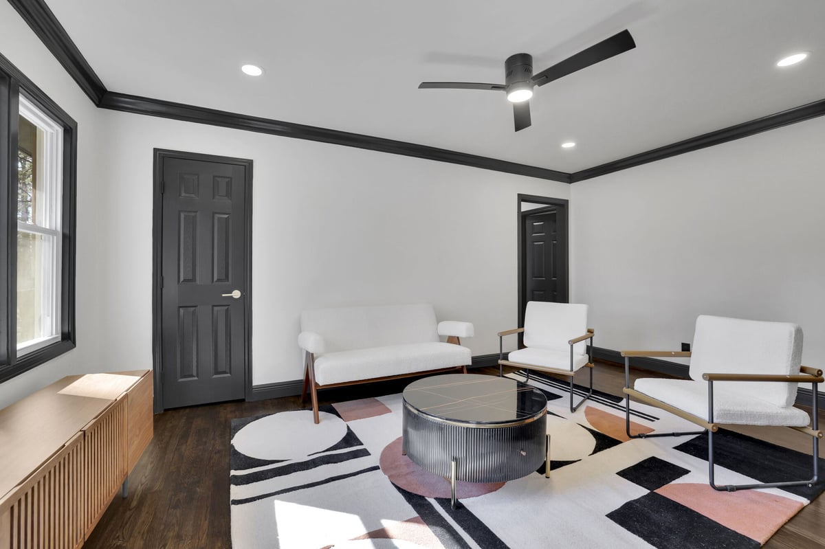 living-room-white-chairs-black-coffee-table-geometric-rug-atlanta-ga-optimized