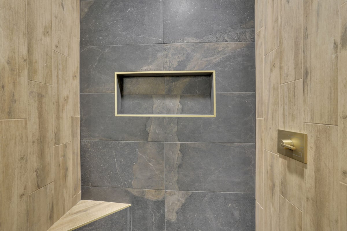 shower-niche-tile-gold-fixture-closeup-atlanta-ga-optimized