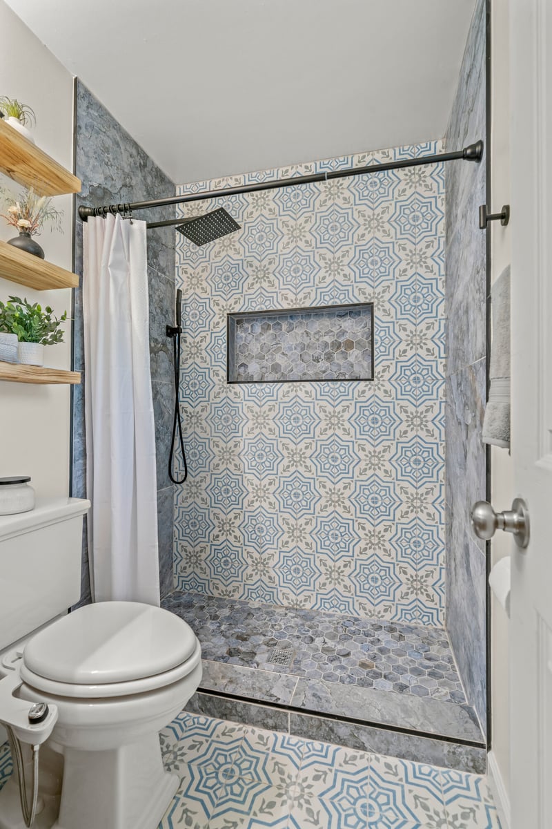 shower-glass-panel-toilet-patterned-tile-atlanta-ga-optimized