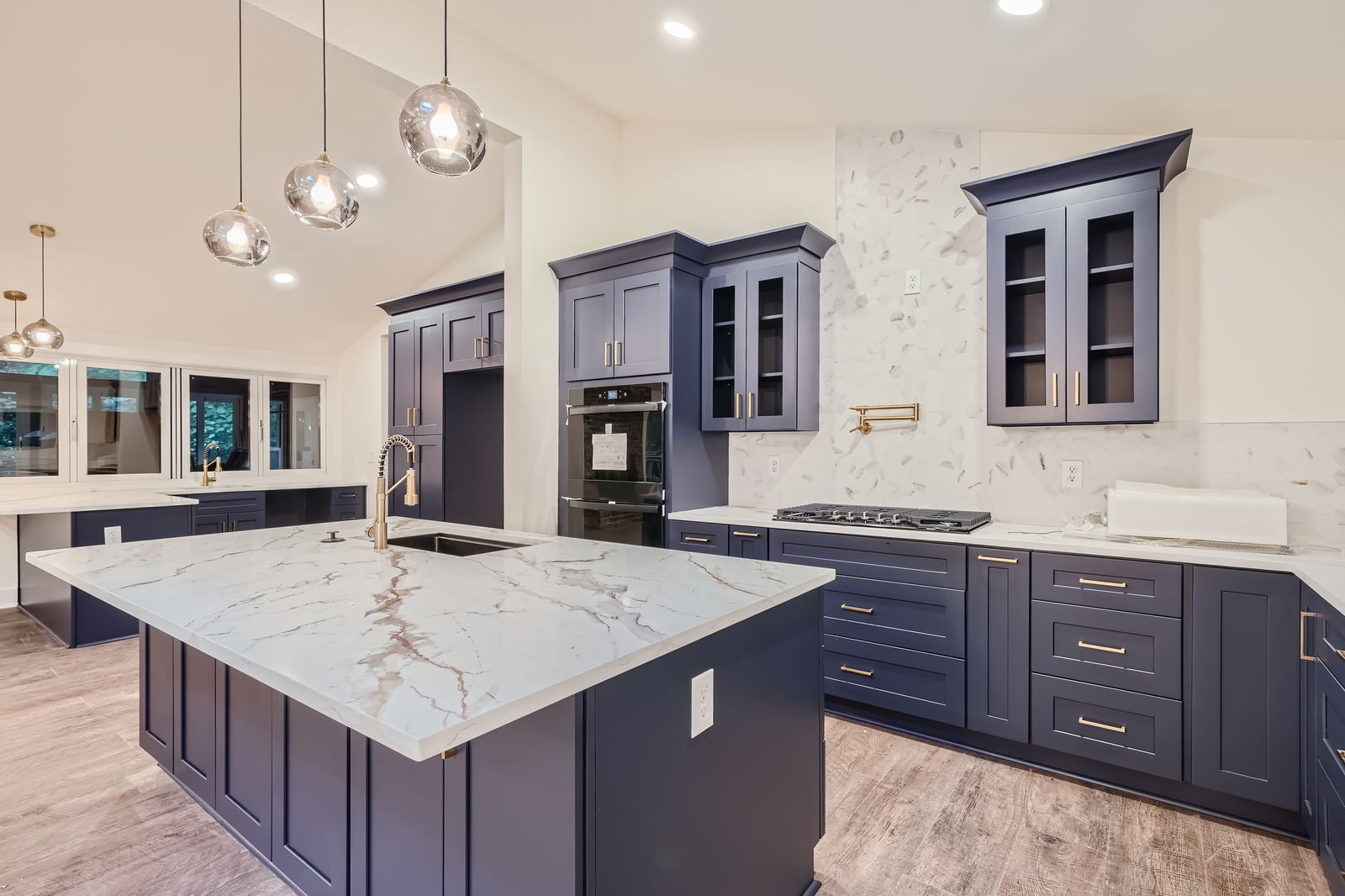 kitchen-navy-cabinets-glass-doors-marble-backsplash-atlanta-ga-optimized