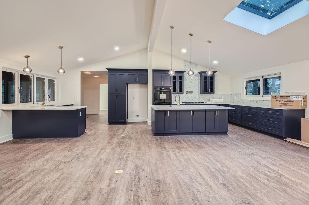 kitchen-navy-cabinets-quartz-island-skylights-atlanta-ga-optimized