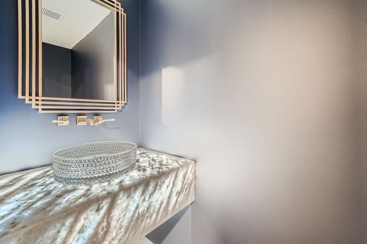 powder-room-vanity-geometric-mirror-marble-counter-atlanta-ga-optimized