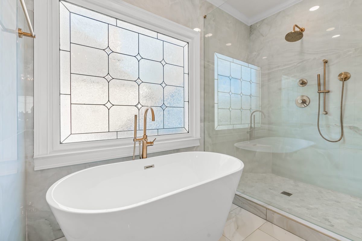 freestanding-tub-glass-shower-gold-fixtures-window-atlanta-ga-optimized
