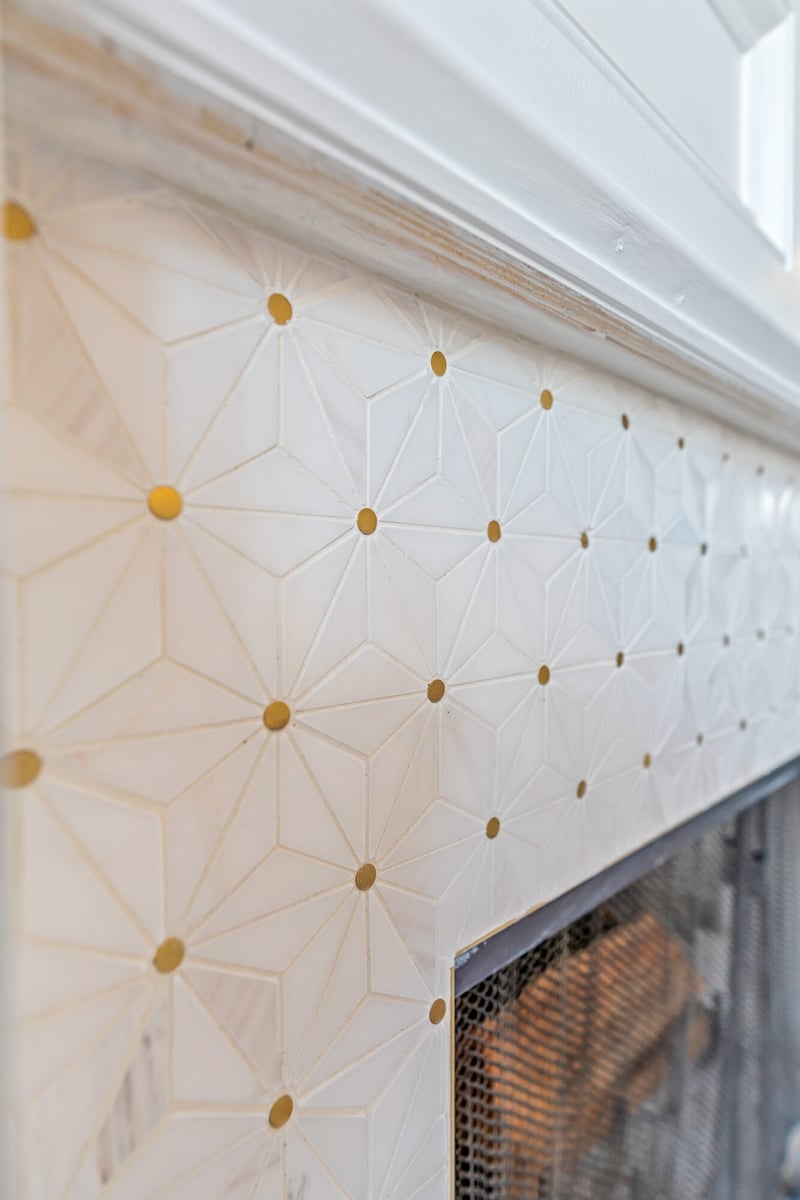 fireplace-surround-geometric-marble-gold-dot-tile-closeup-atlanta-ga-optimized