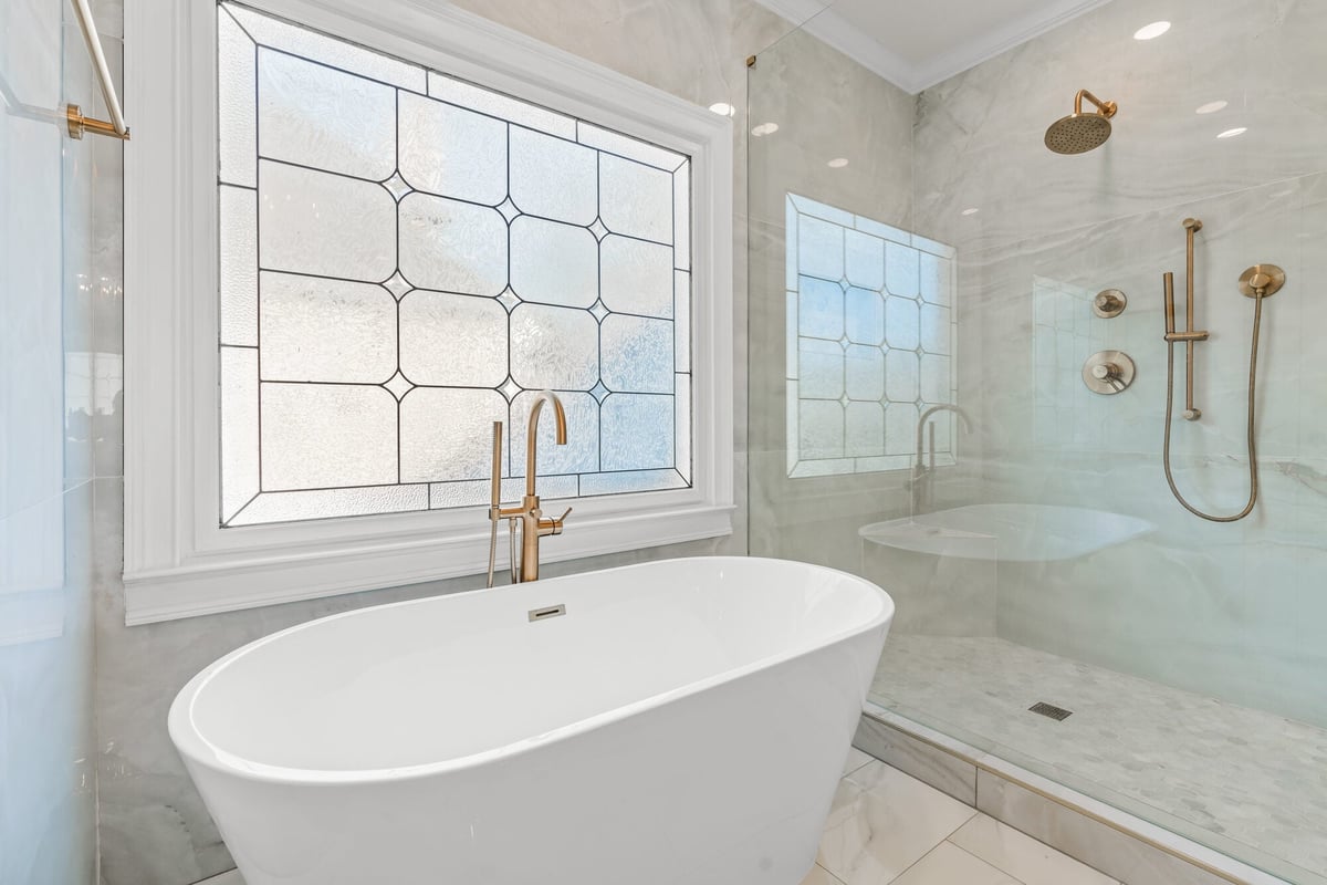 freestanding-tub-glass-shower-gold-fixtures-window-atlanta-ga-optimized
