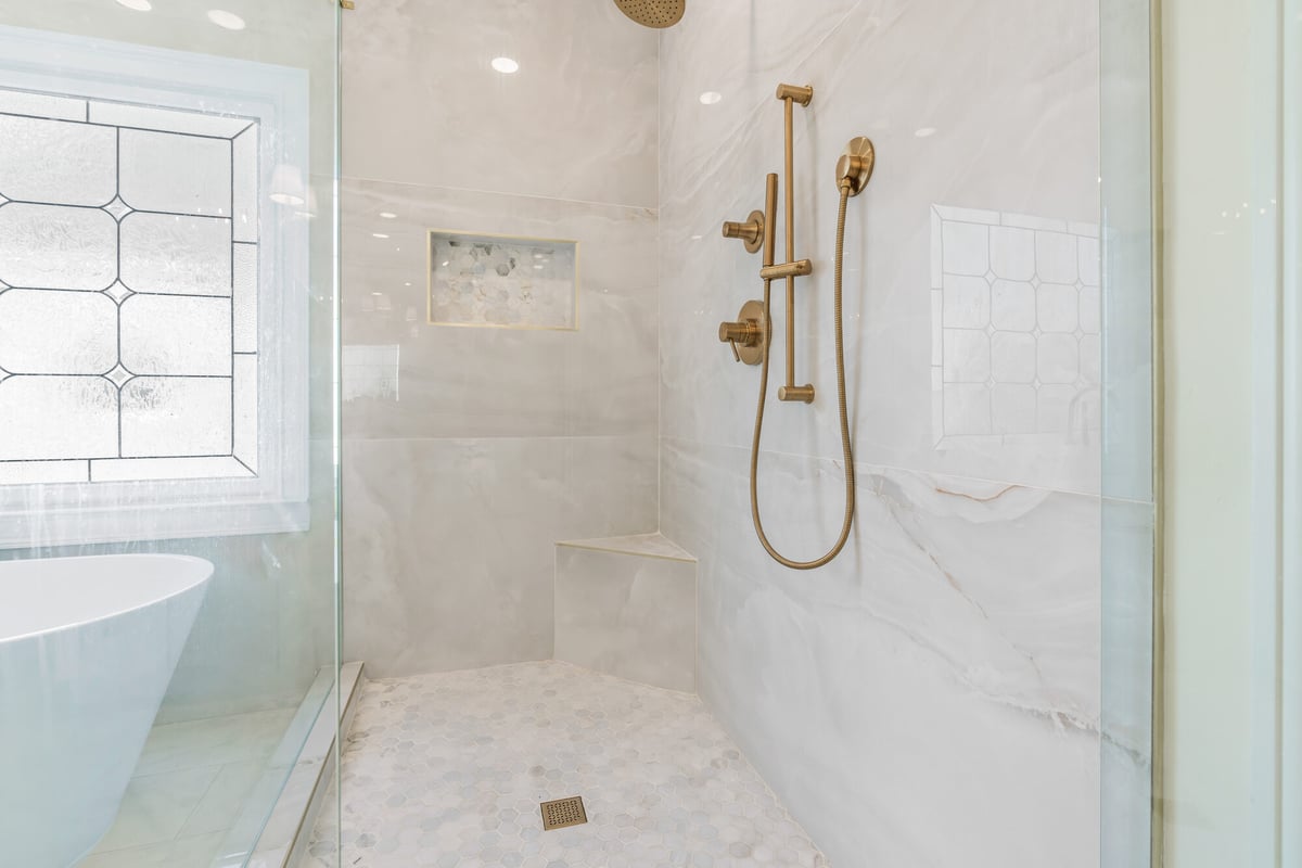 glass-shower-tub-gold-fixtures-tile-niche-atlanta-ga-optimized