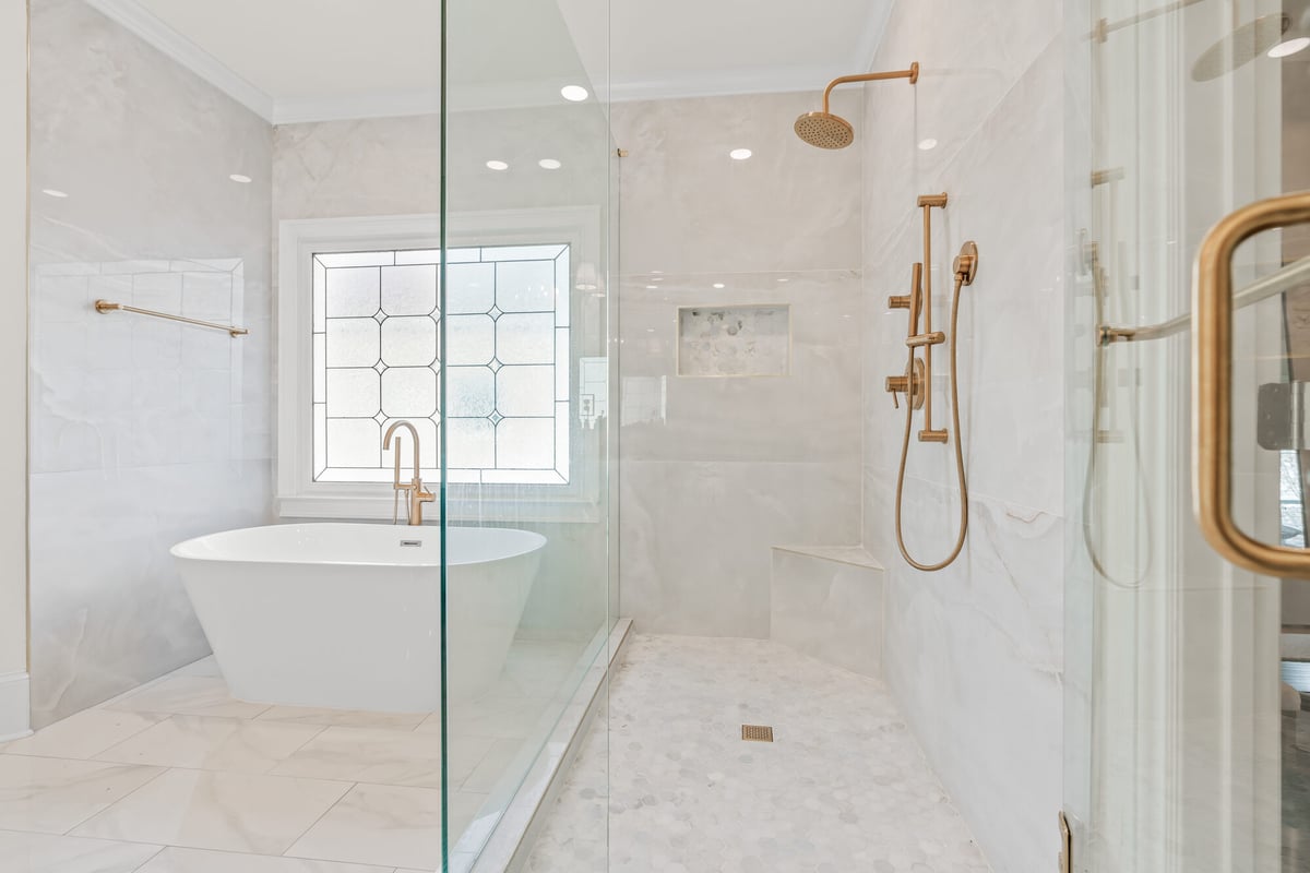 glass-shower-tub-gold-fixtures-window-atlanta-ga-optimized