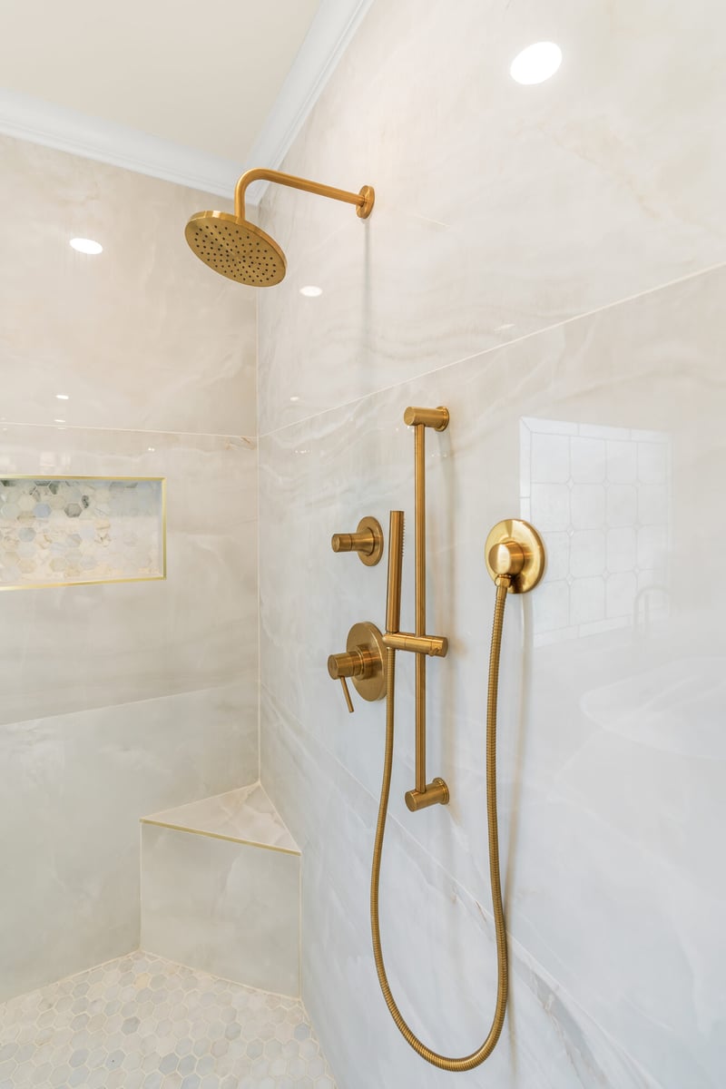 shower-fixtures-gold-hardware-tile-closeup-atlanta-ga-optimized