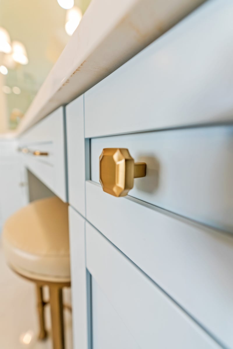 vanity-cabinet-blue-cabinetry-gold-hardware-closeup-atlanta-ga-optimized