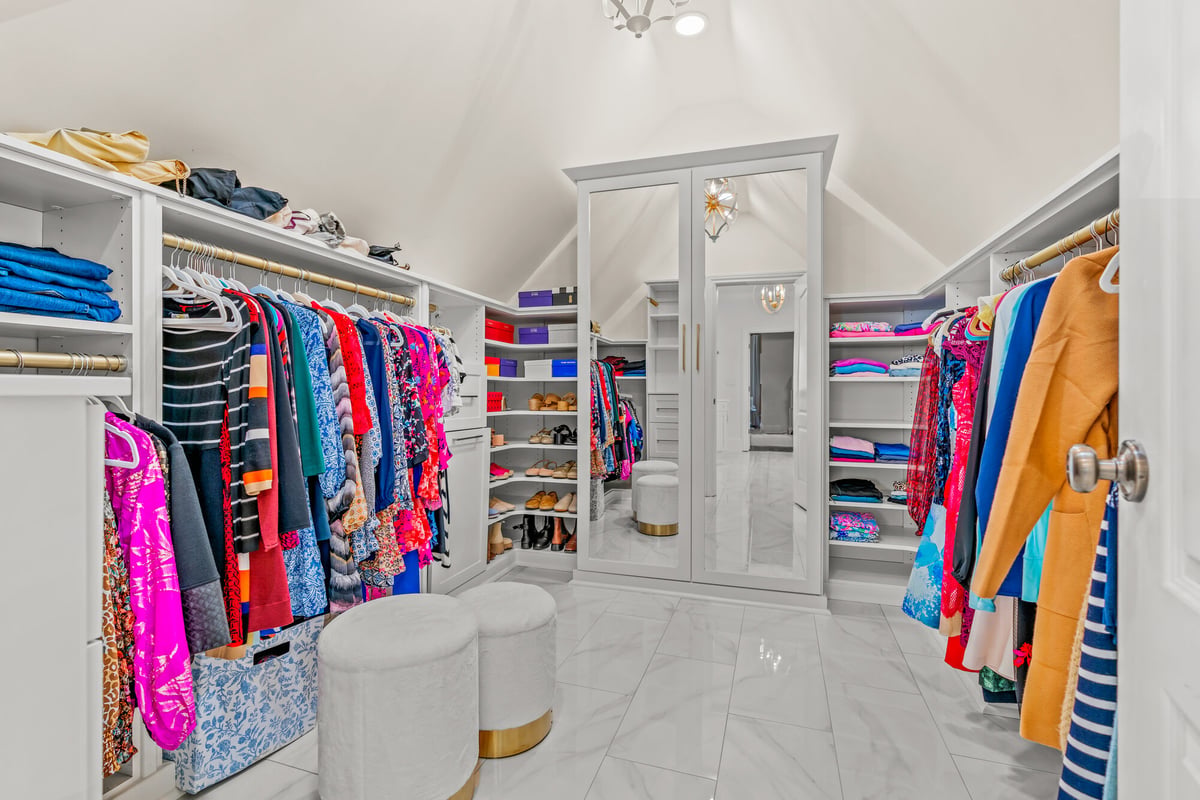 walk-in-closet-vaulted-ceiling-clothing-racks-atlanta-ga-optimized