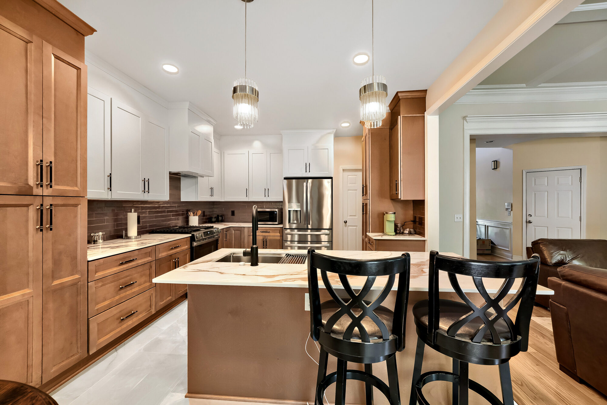 kitchen-island-bar-stools-pendant-lighting-wood-cabinetry-atlanta-ga-optimized
