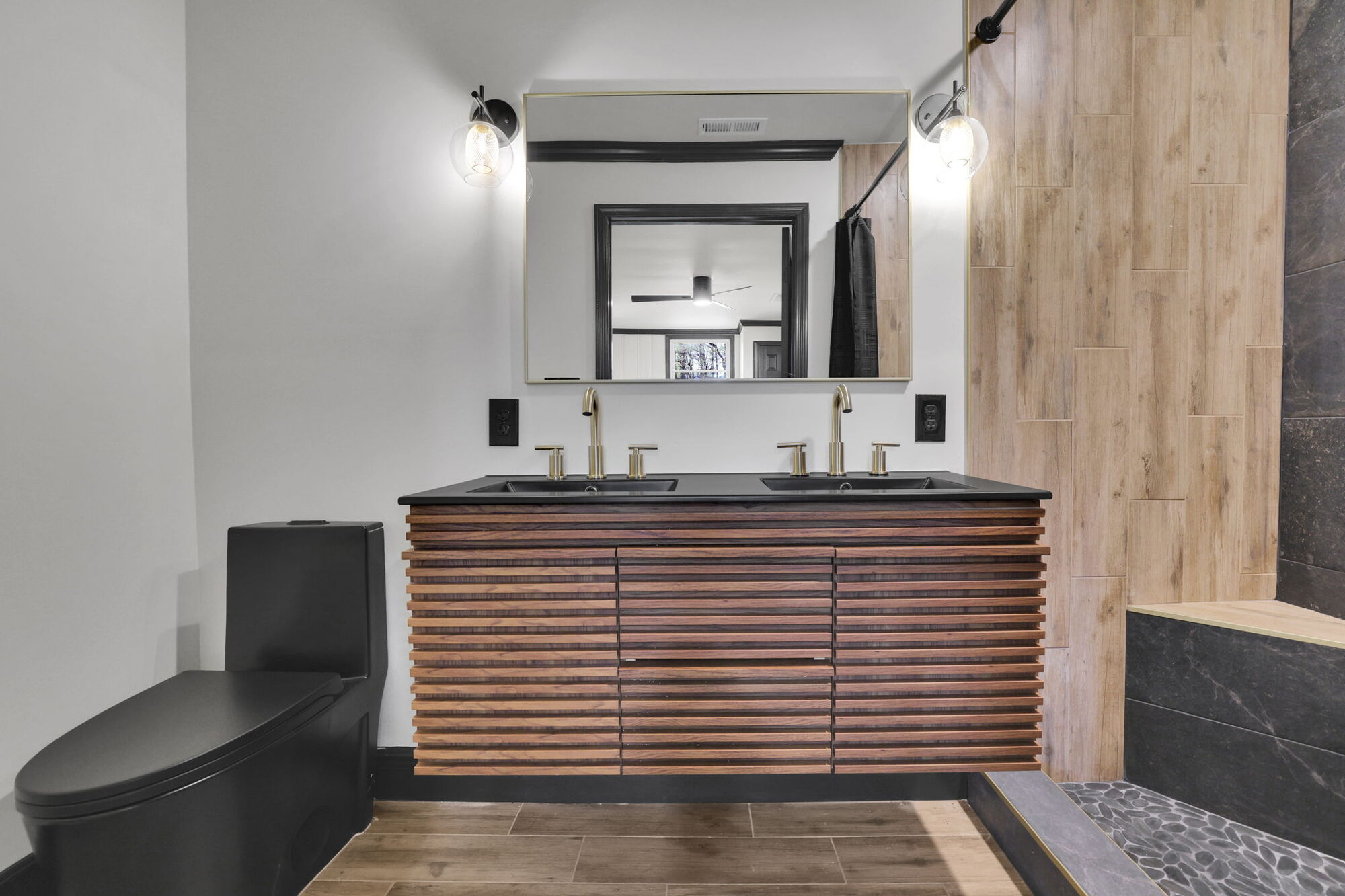 bathroom-wood-slat-vanity-black-countertop-black-toilet-atlanta-ga-optimized