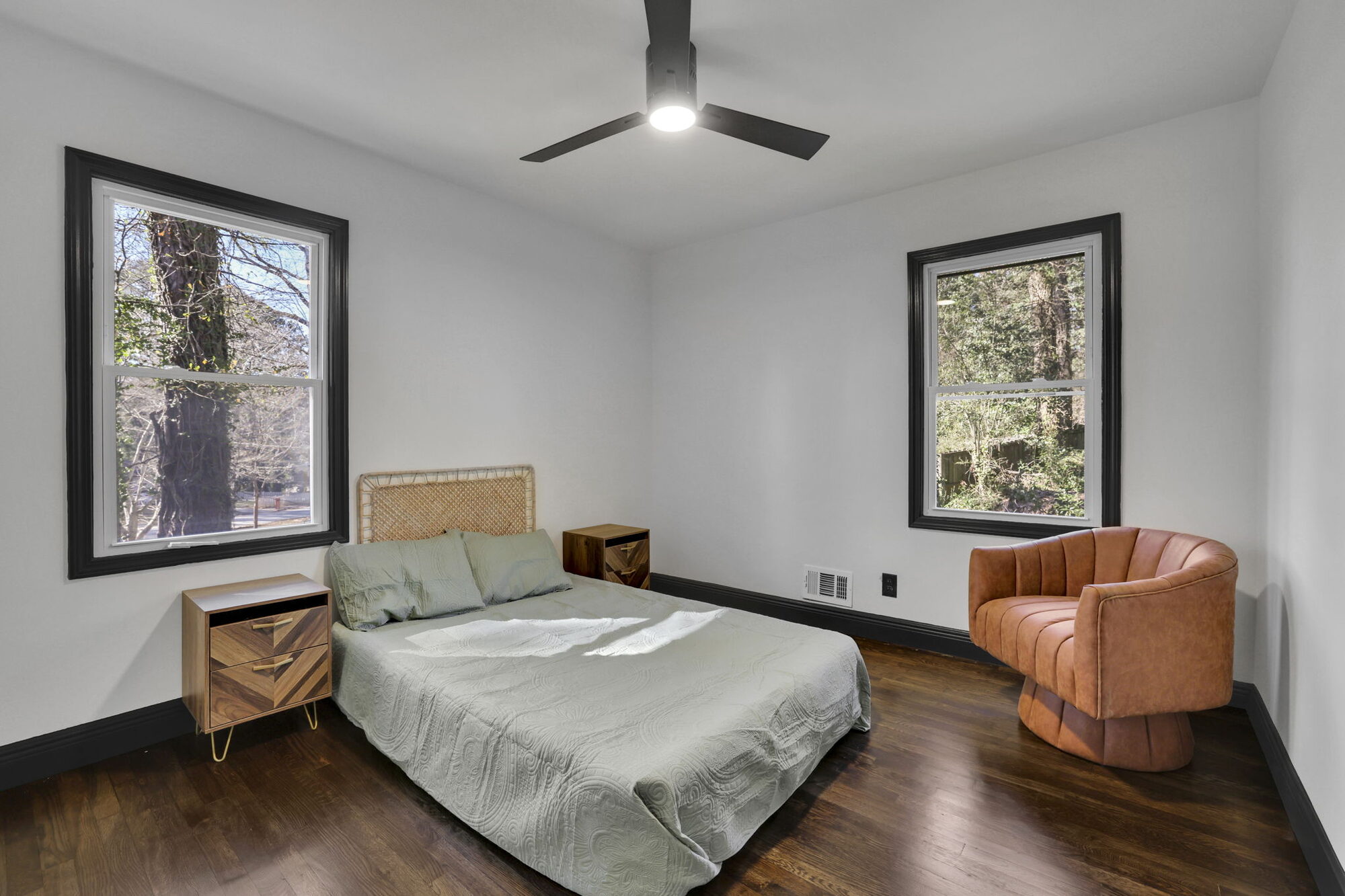 bedroom-bed-leather-chair-ceiling-fan-atlanta-ga-optimized