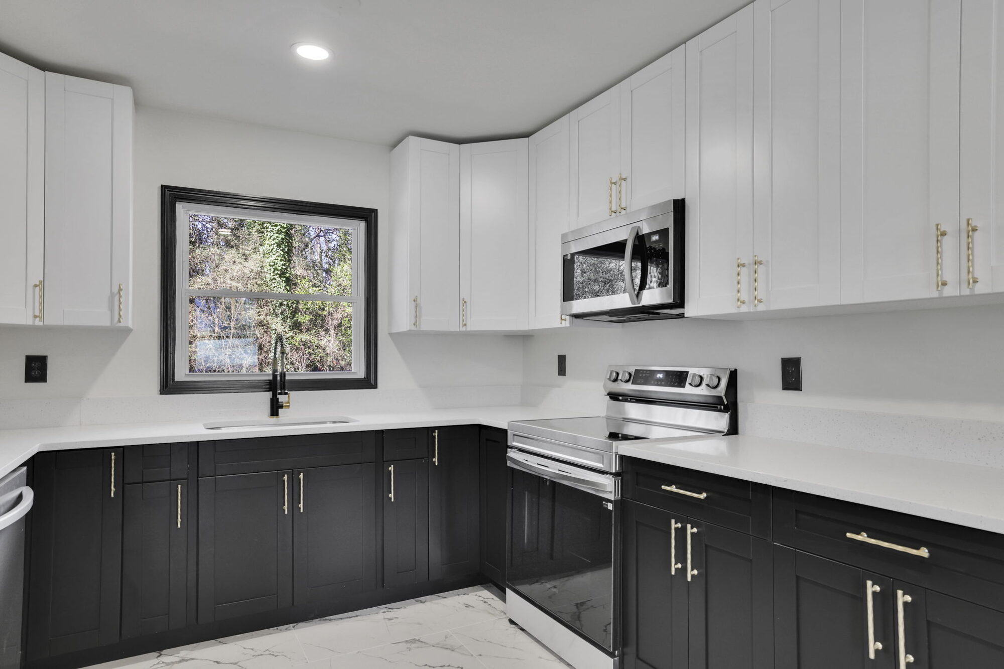 kitchen-white-upper-black-lower-cabinets-window-over-sink-atlanta-ga-optimized