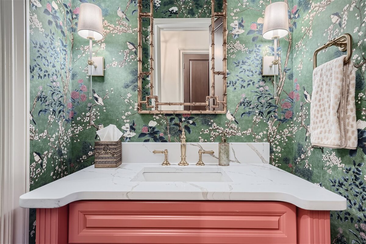 bathroom-vanity-closeup-coral-cabinet-gold-fixtures-atlanta-ga-optimized